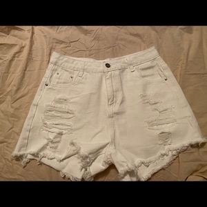 Never worn white ripped jean shorts